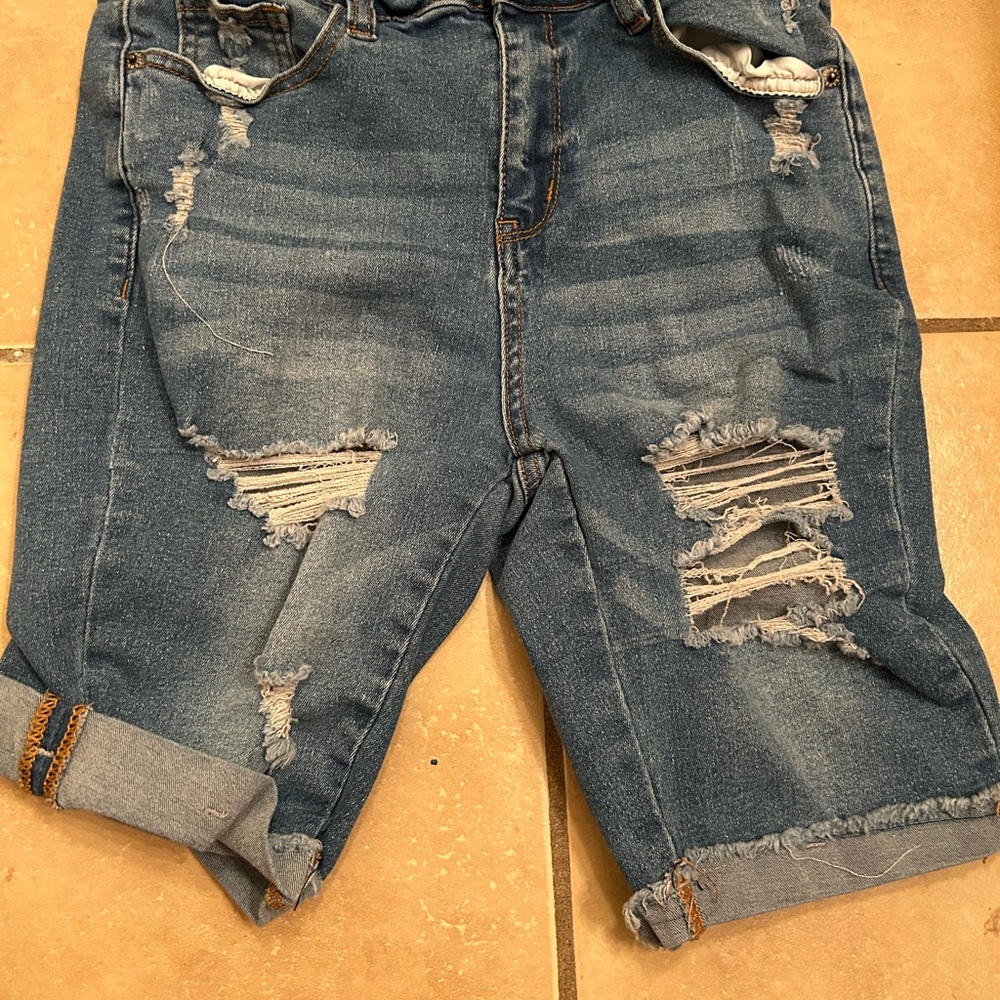 Women’s Knee Length Distressed Denim Shorts